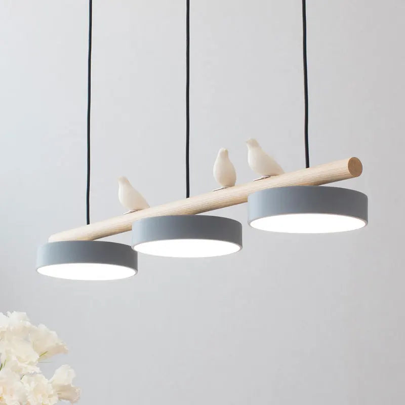 Nordic minimalist LED pendant light with bird decoration and macaron finish