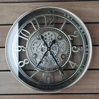 industrial metal wall clock with decorative moving gears