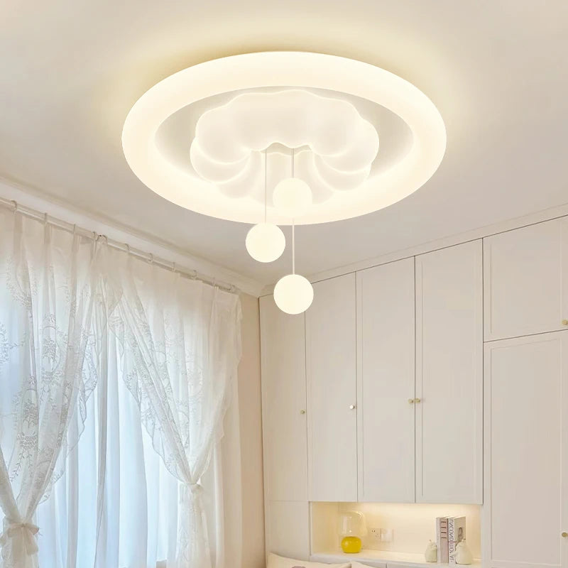 Cloud ceiling light for children's room in creamy playful style