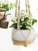 decorative woven hanging basket with wooden beads