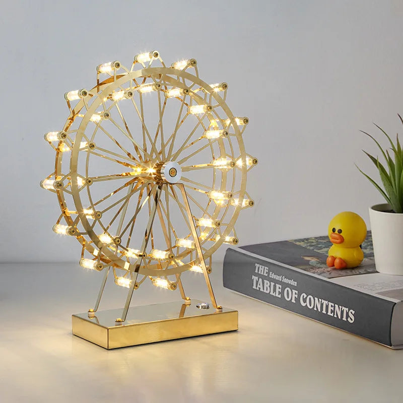 Rotating LED ferris wheel stainless steel table lamp