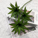 Tropical potted plant with decorative palm and bamboo