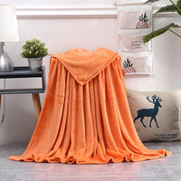 Soft warm coral fleece flannel throw for sofa or bed