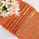 Orange sequin table runner for festive and wedding decoration