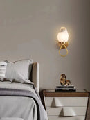 Modern copper wall light with white glass for hallway