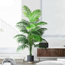 Tropical artificial plants palm tree and monstera for indoor and outdoor decor
