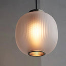 Modern round glass pendant light for various spaces