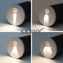 Sandiy round LED wall light with motion sensor