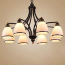Vintage iron and bronze chandelier with glass shade, loft style