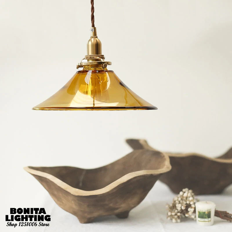 Vintage glass pendant light with brass base and switch