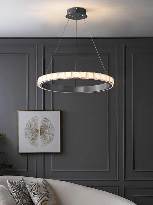 Minimalist aluminium and acrylic pendant light with refined design for interiors