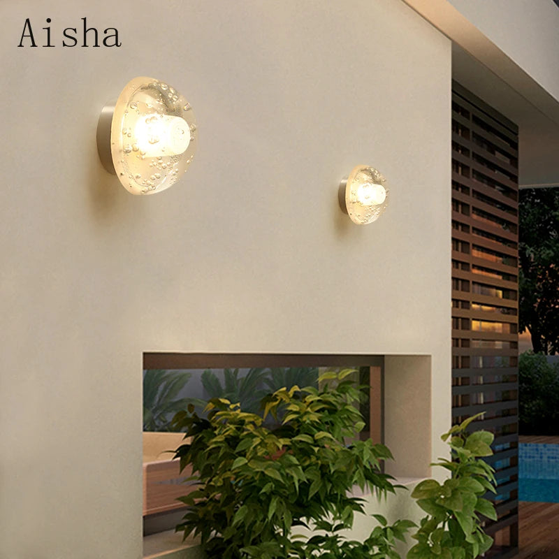 Decorative LED outdoor wall light for exterior spaces
