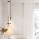 Cylindrical marble and gold metal pendant light for modern interiors