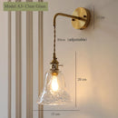 Vintage glass wall light with brass socket