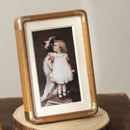 Wooden photo frame with copper corners for elegant decor
