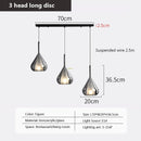 Multi-head glass pendant light for modern interiors