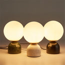Marble and glass table lamp for an elegant interior