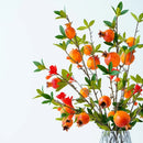 Artificial green plant with 5 pomegranate heads for interior decoration
