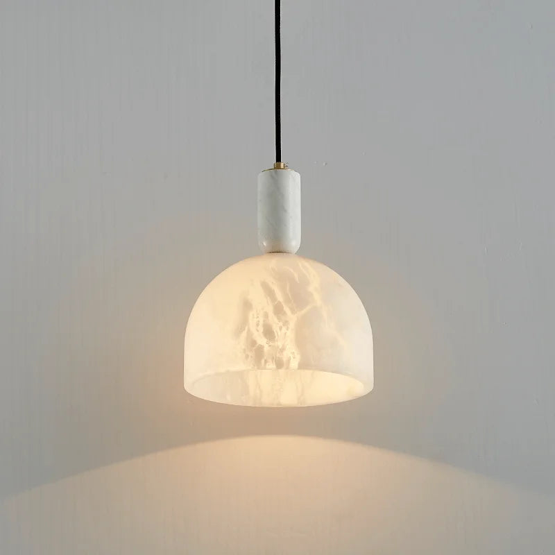 Alabaster pendant light with copper base for elegant interiors