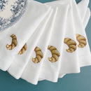 Embroidered linen napkin with croissant motif, customisable