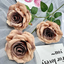 Silk floral decoration with roses and branches for parties