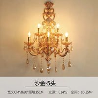 Elegant gold crystal wall light with five heads for stylish interiors