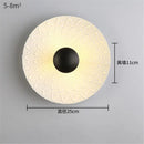 Nordic round metal LED wall light for modern interiors