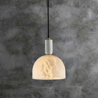 Alabaster pendant light with copper base for elegant interiors