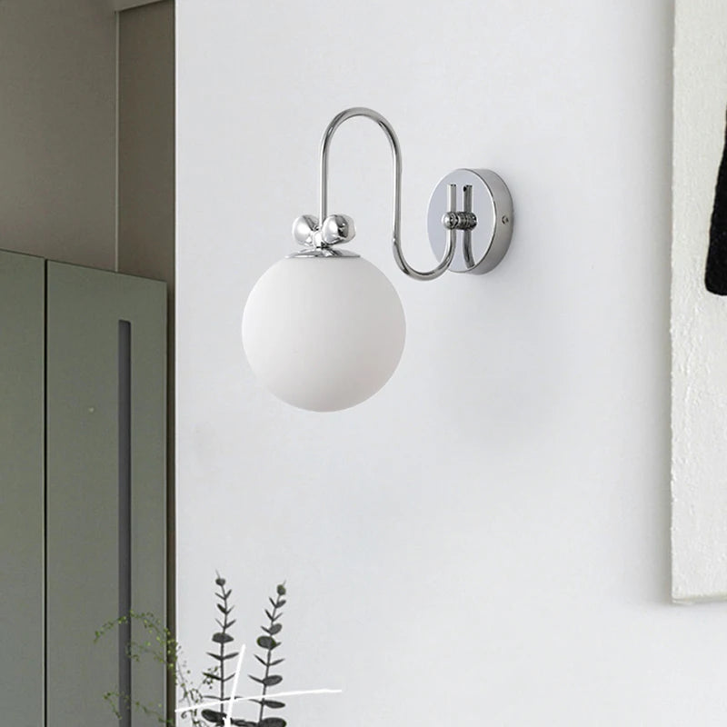 Bauhaus bowknot round LED chrome wall light