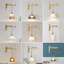 Glass, wood and ceramic wall light with foldable swivel arm