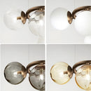 Nordic smoked glass and gold chandelier for modern interiors