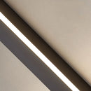 Minimalist cuboid LED wall light in aluminium with remote dimming