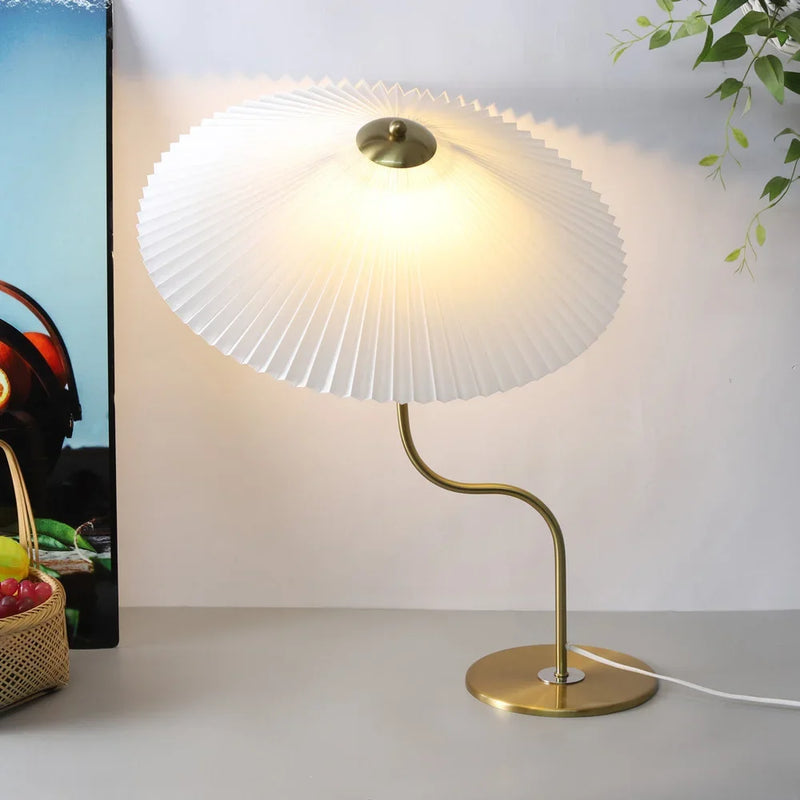 Retro table lamp with decorative pivoting umbrella shape