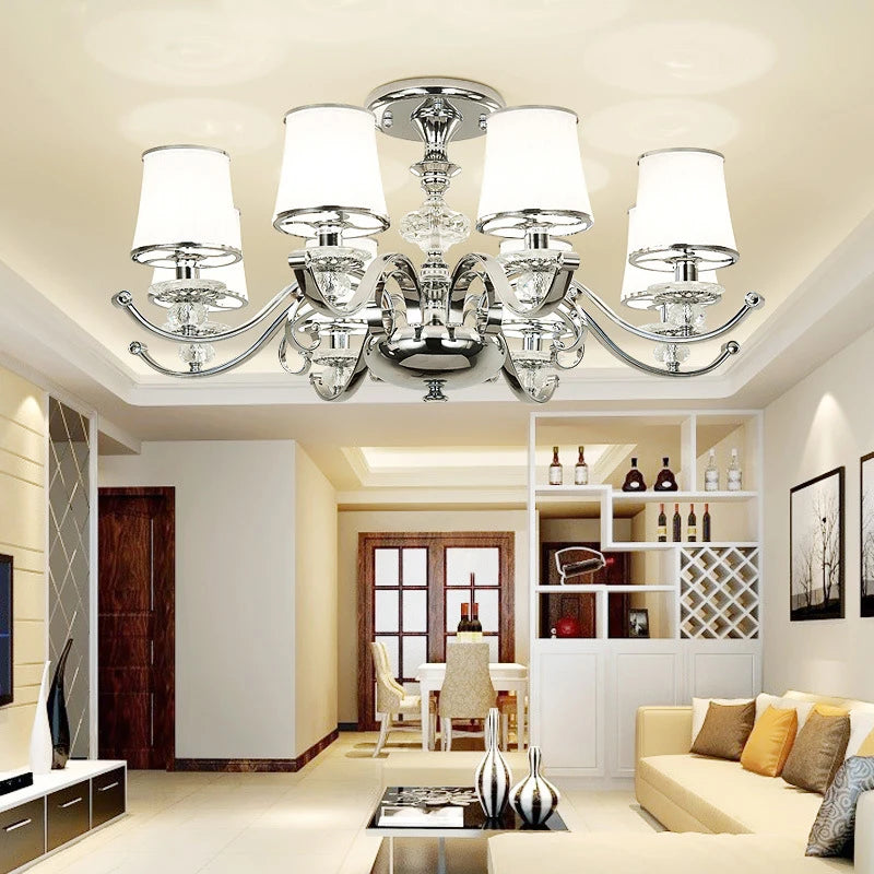 Modern chrome chandelier with white shades