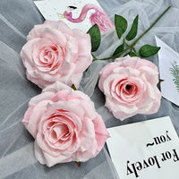Silk floral decoration with roses and branches for parties