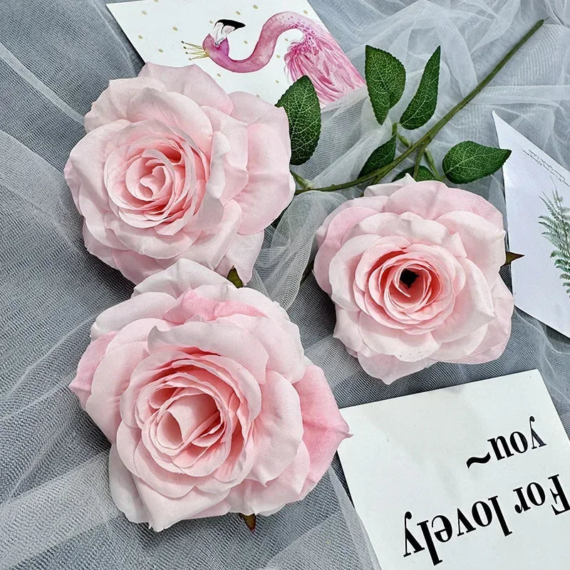 Silk floral decoration with roses and branches for parties