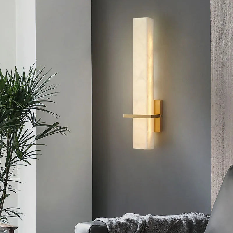 Cuboid marble and copper wall light for ambient lighting