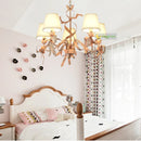 Pink ribbon chandelier for elegant children's bedroom