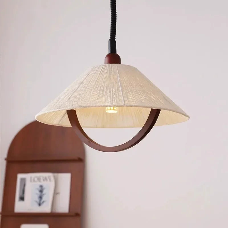 Retractable cotton and wood pendant light for interiors