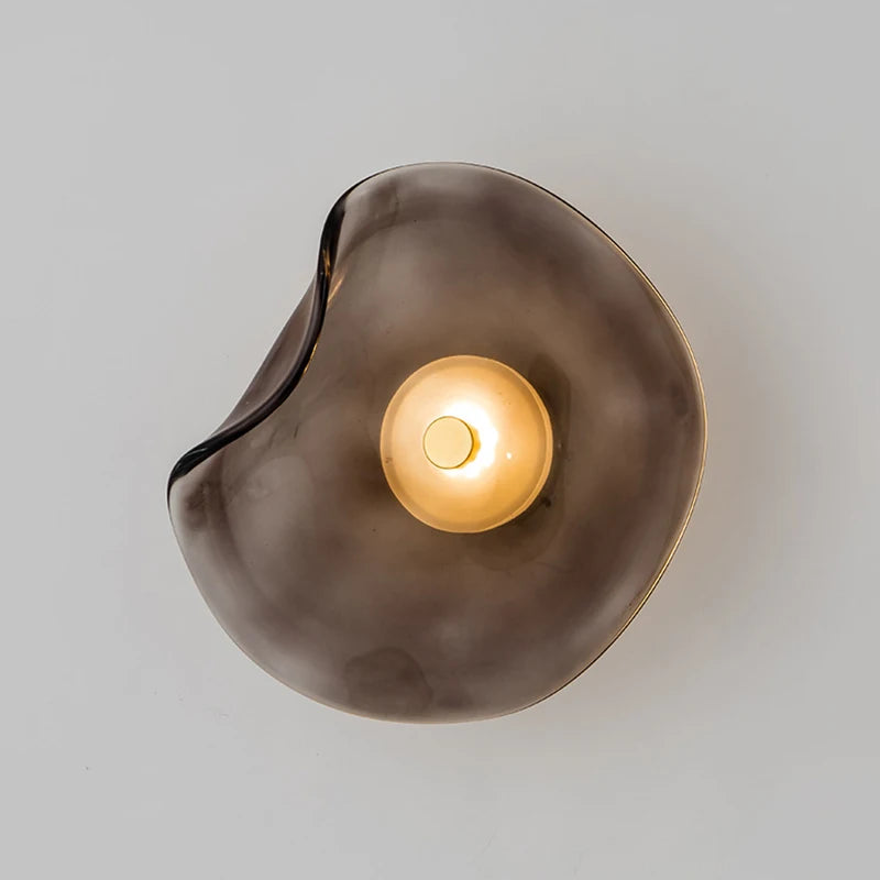 Modern LED glass wall light with curved surface lighting