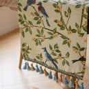 Country-style jacquard table runner with animal motifs and tassels