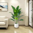 Artificial banana tree and tropical palm plants for festive decoration
