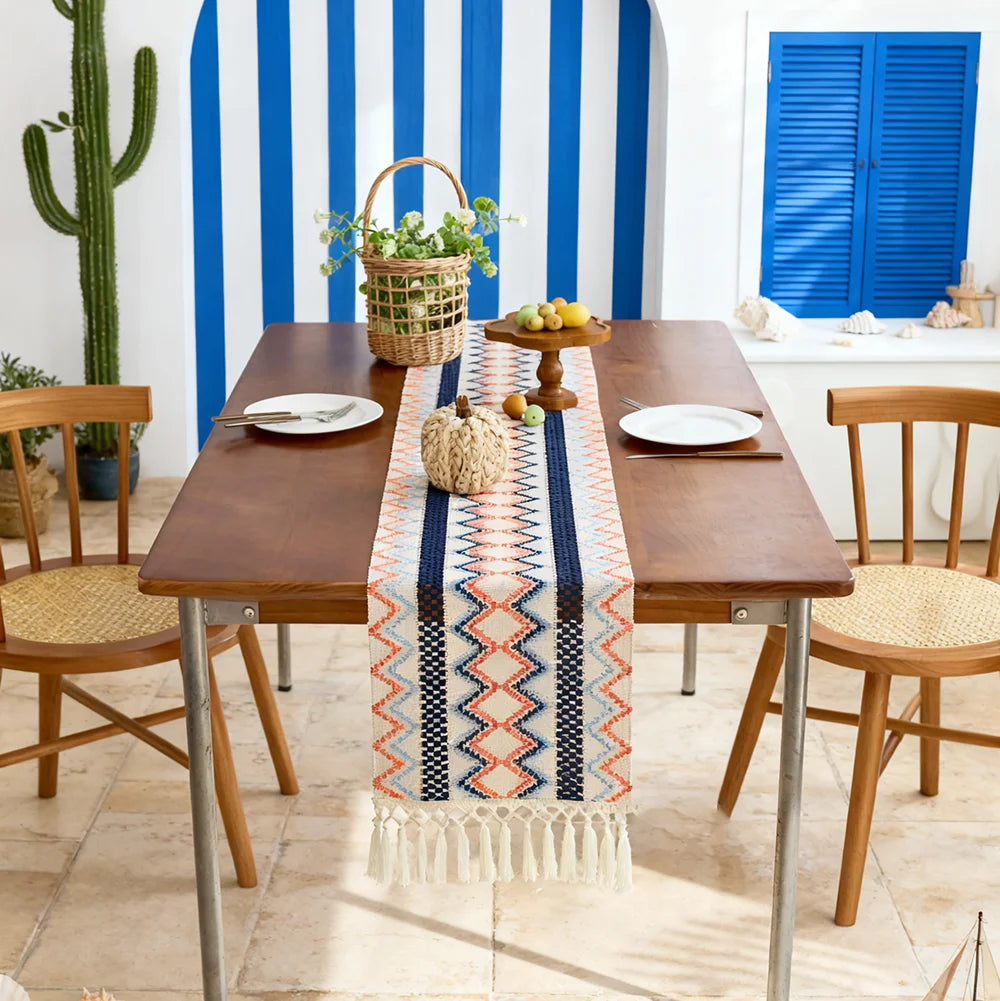 Bohemian table runner with Aztec pattern in beige and tassels