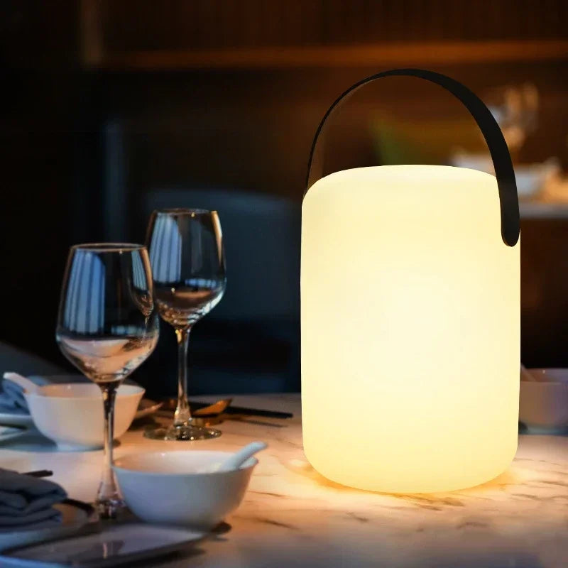 Rechargeable portable lamp with 16 remote-controlled colours