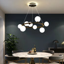 Modern matt glass chandelier with black ring and adjustable cable