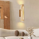 Art deco wall light in natural stone and wood for a warm ambience