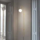 Minimalist brass wall light for multiple uses