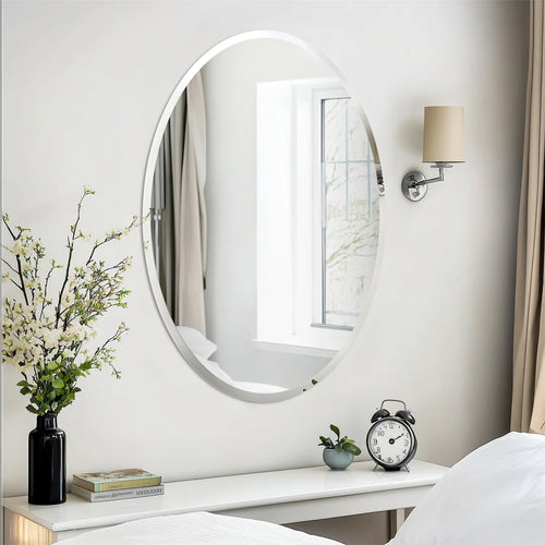 Decorative oval frameless mirror for elegant interiors