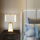 Modern glass table lamp with decorative gold frame
