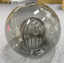 Round glass pendant light with elegant industrial style